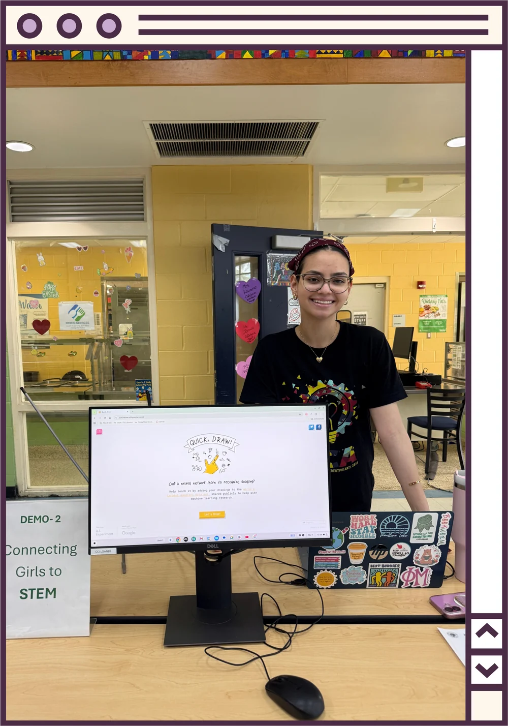 Mariana at a Connecting Girls to STEM demo table with a computer showing Google's Quick, Draw!